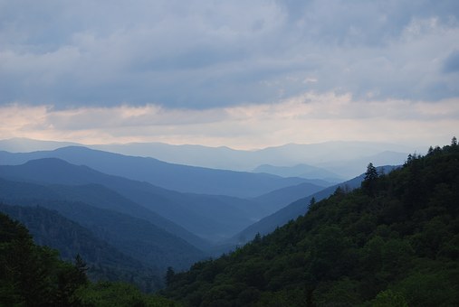 During The Cades Cove Bus Tour you'll be surrounded by lovely mountain views.