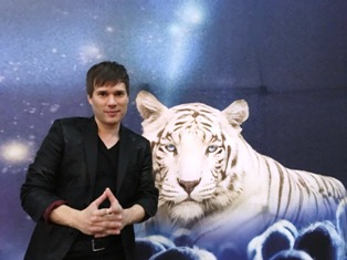 The Magic Beyond Belief Christmas Show features magician Darren Romeo and this beautiful white tiger.